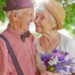 Happy elderly couple in love enjoying summer day together